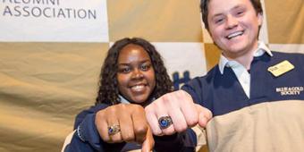 students showing off their new class ring