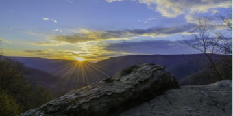 sunset from the view of a moutain